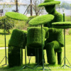 室内外仿真草雕 人物绿雕设计 架子鼓小人制作 生态园装饰绿雕