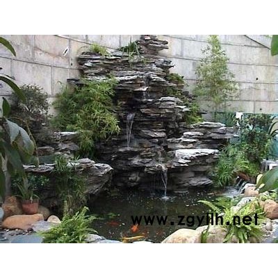 东莞石碣镇假山订作、别墅假山盆景、假山鱼池建造、假山造雾